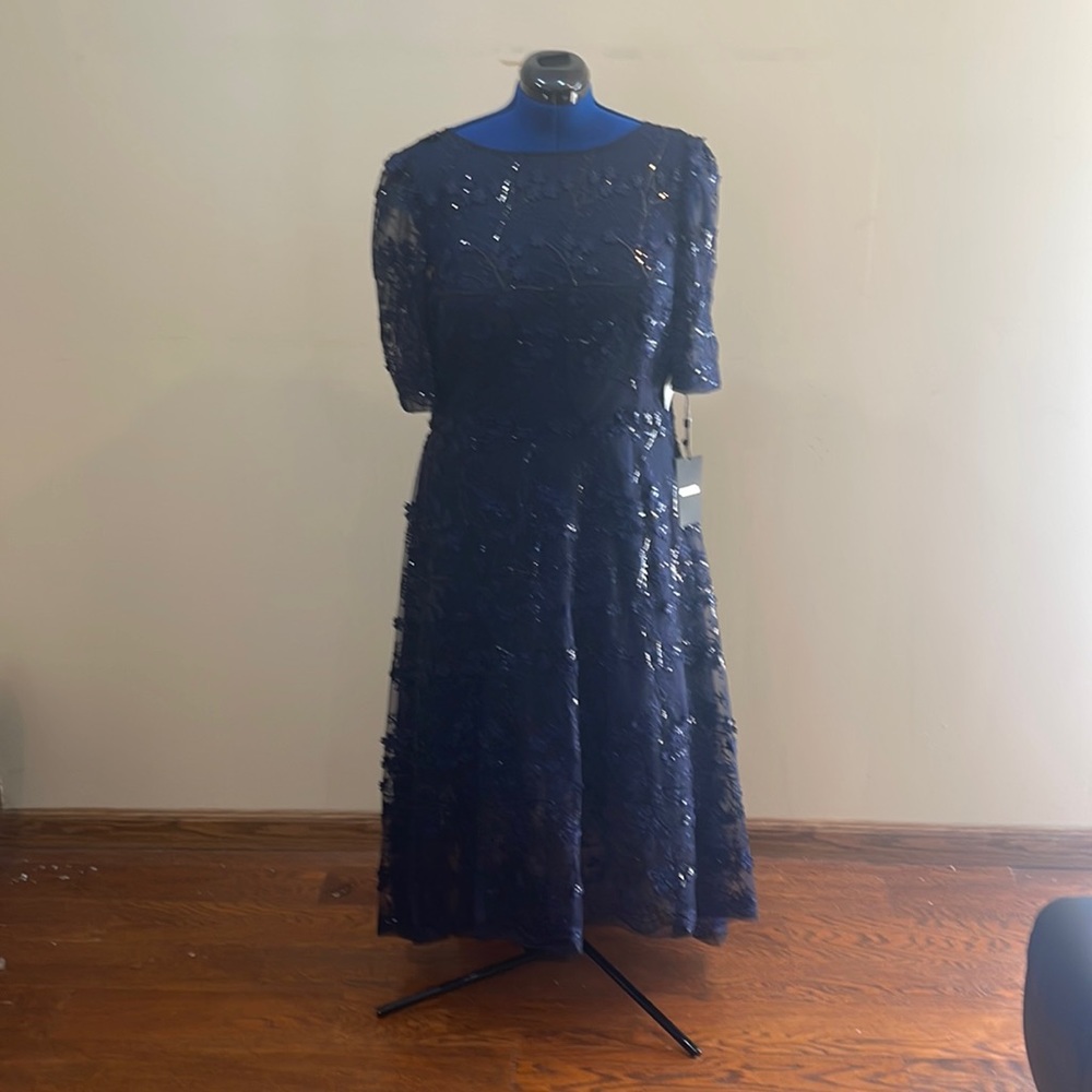A navy blue floral high low dress